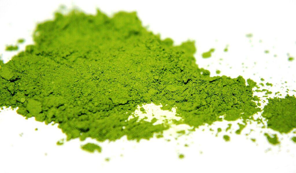 A mound of finely ground green matcha powder