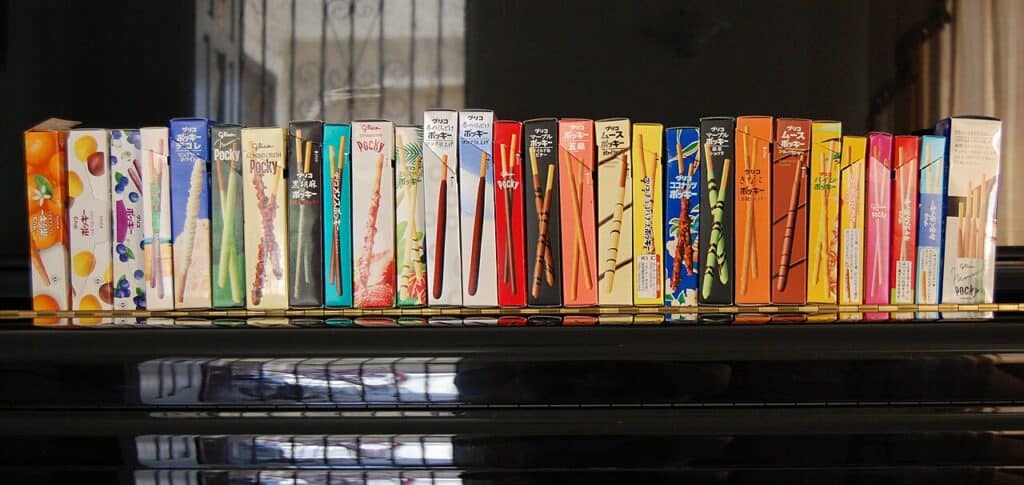 A shop display of Pocky boxes in several flavors