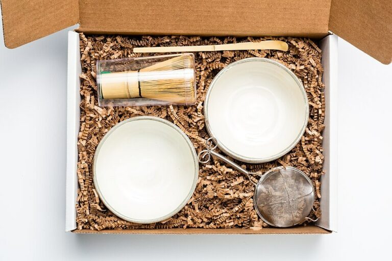 Boxed matcha equipment set with two bowls and bamboo whisks