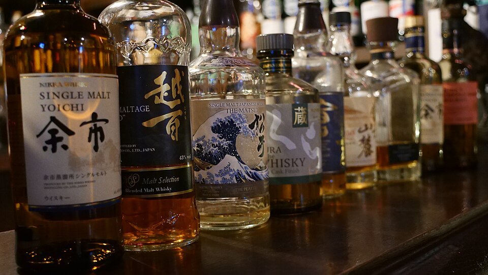 Selection of Japanese whisky bottles arranged on a counter